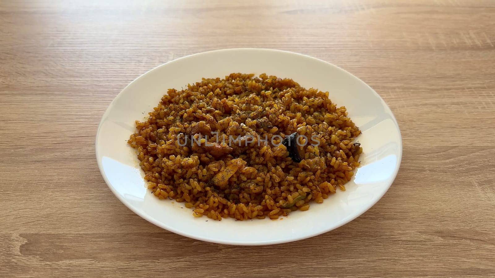 A vibrant plate of Nigerian Jollof rice with chicken, perfect for family gatherings and celebrations.