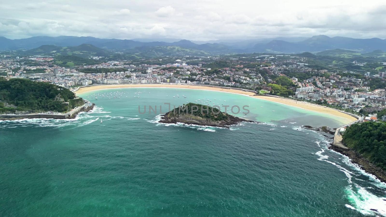 A stunning aerial perspective showcases breathtakingly beautiful islands alongside a vibrant coastal town