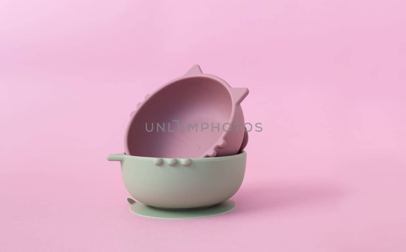 Set of children's bowls. Baby eco silicone tableware. Nutrition and feeding concept. Baby led weaning
