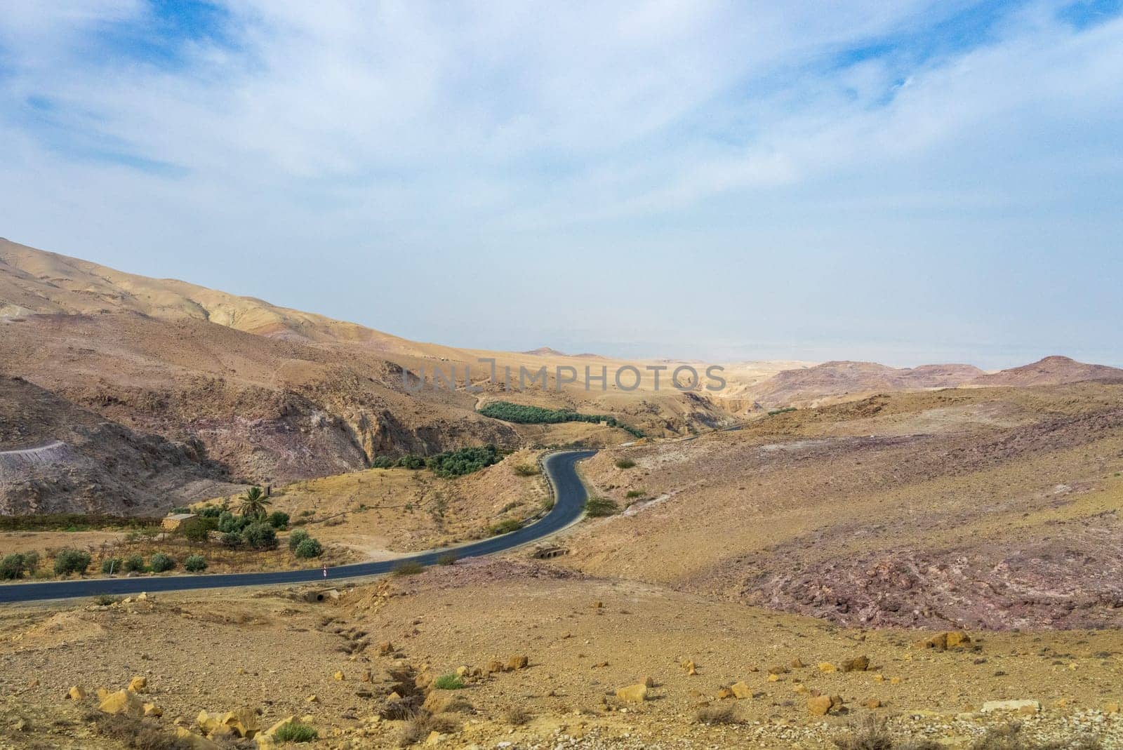Arid landscape in Jordan on the road from the Dead Sea to Mount Nebo in the desert area of the country