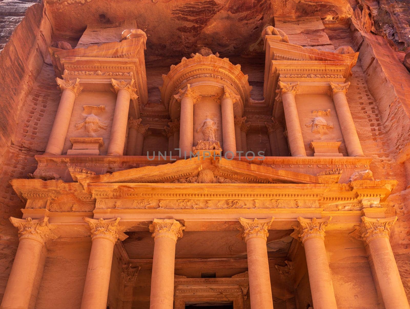 Detail of the carved facade of the Treasury building or Al-Khazneh in the ancient city of Petra
