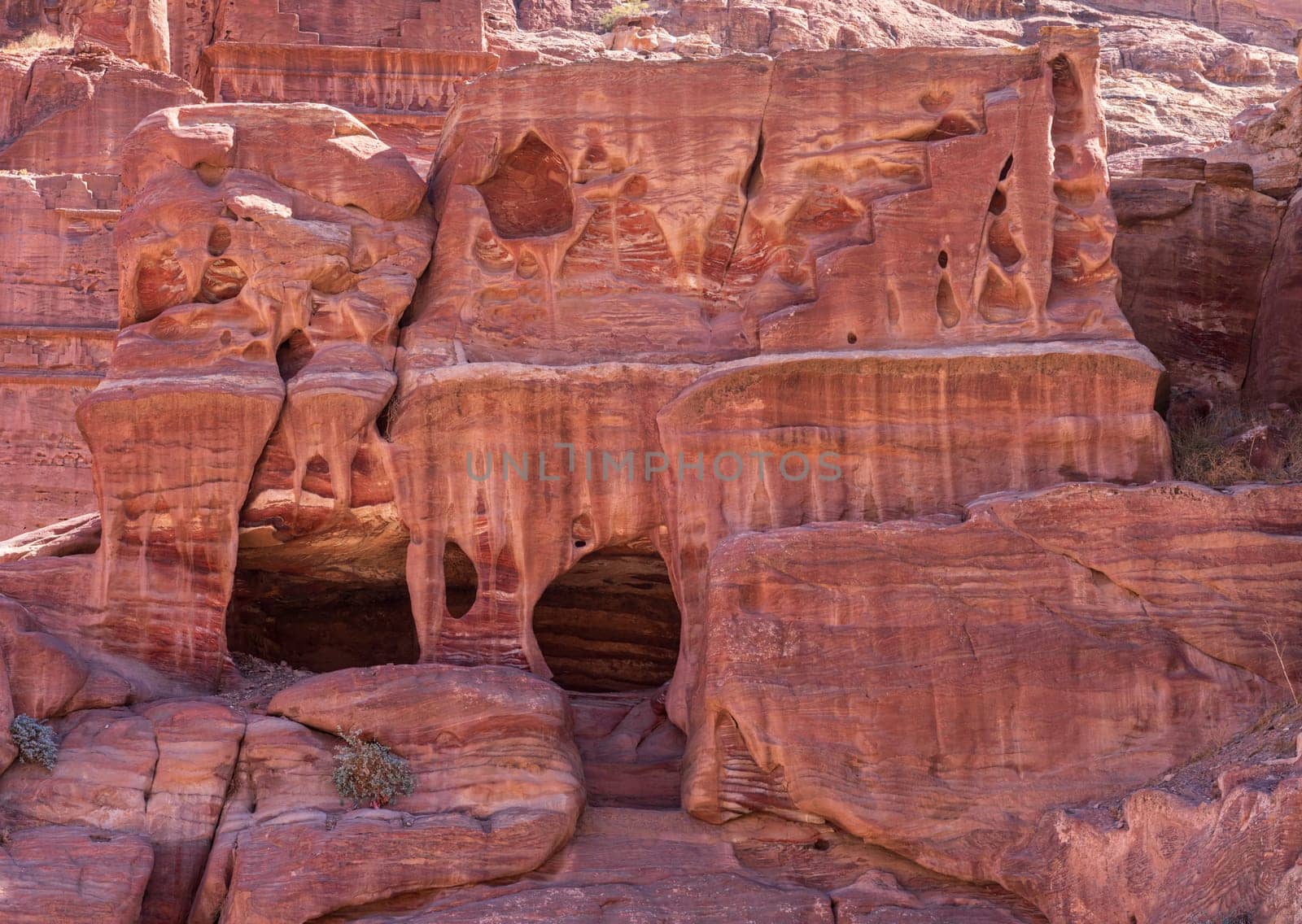 Unusual geology of a tomb in the wall near the Royal Tombs of Petra in Jordan