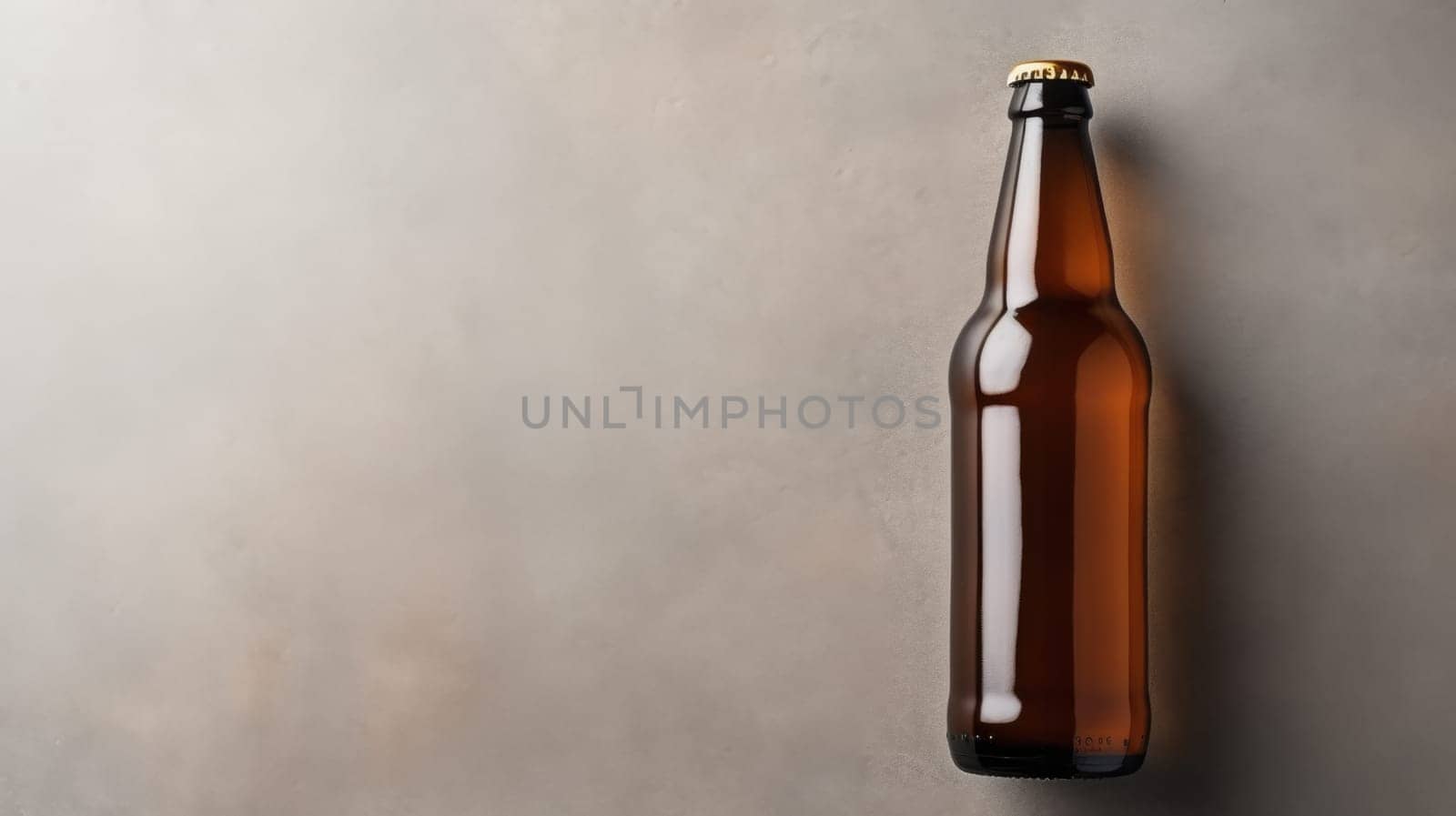 This image features a realistic amber beer bottle with a shiny golden cap. Positioned on the left side, the bottle is elegantly angled away from the camera, set against a smooth grey background.