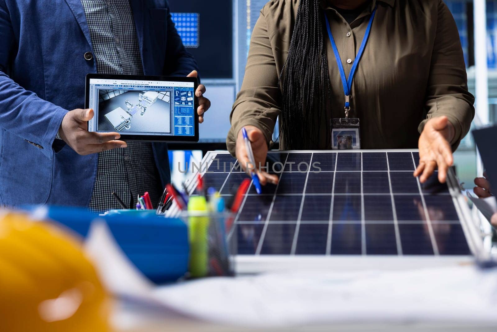 Photovoltaics factory investors evaluating solar panel structure design, addressing technical considerations and innovations for advancing clean energy technology, close up shot