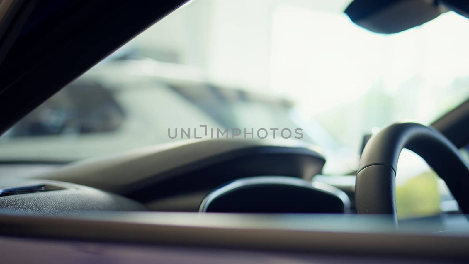 Details close up shot of car door lock controls handling opening and closing of windows and door providing safety and security from outside while driving. Panning shot of vehicle door buttons