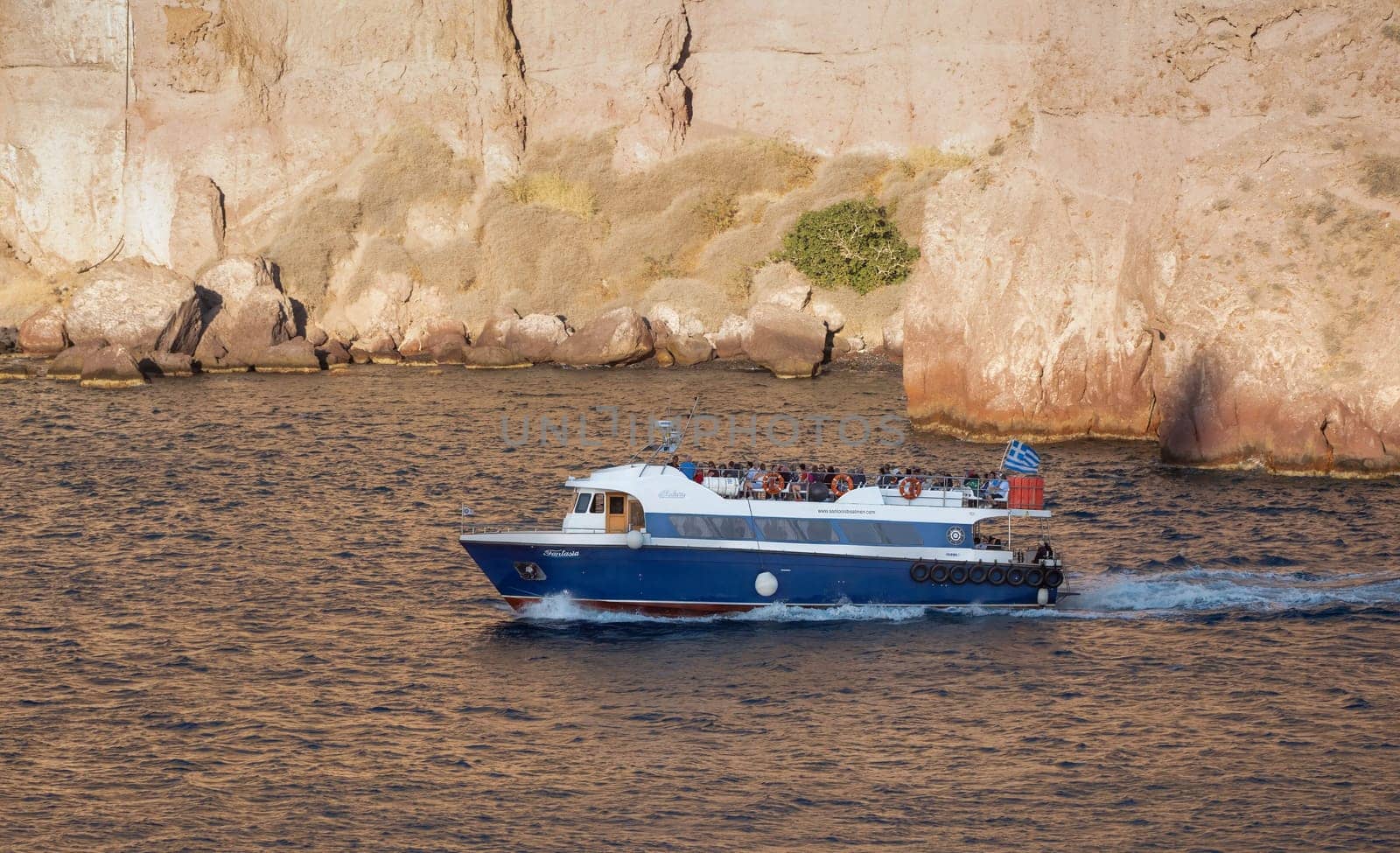SANTORINI, GREECE - October 23, 2024: Tour Boat in Santorini Greece