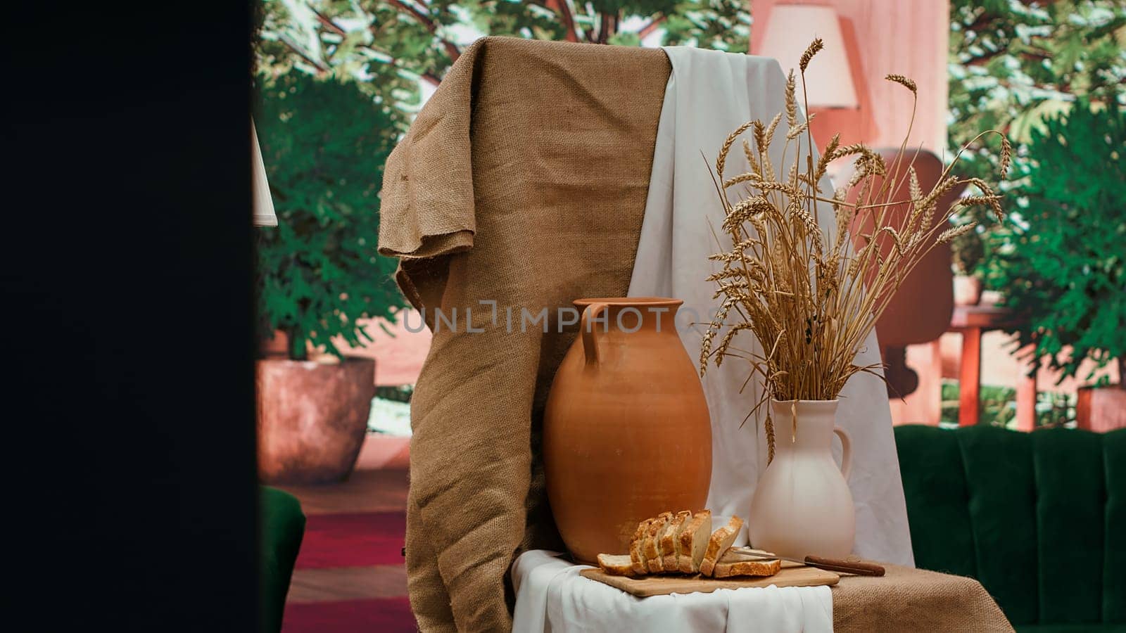 Empty artistic atelier with a rustic watercolor painting displayed on canvas, creative process with acrylic paint in a contemporary art and craft workshop. Masterpiece creation and supplies.