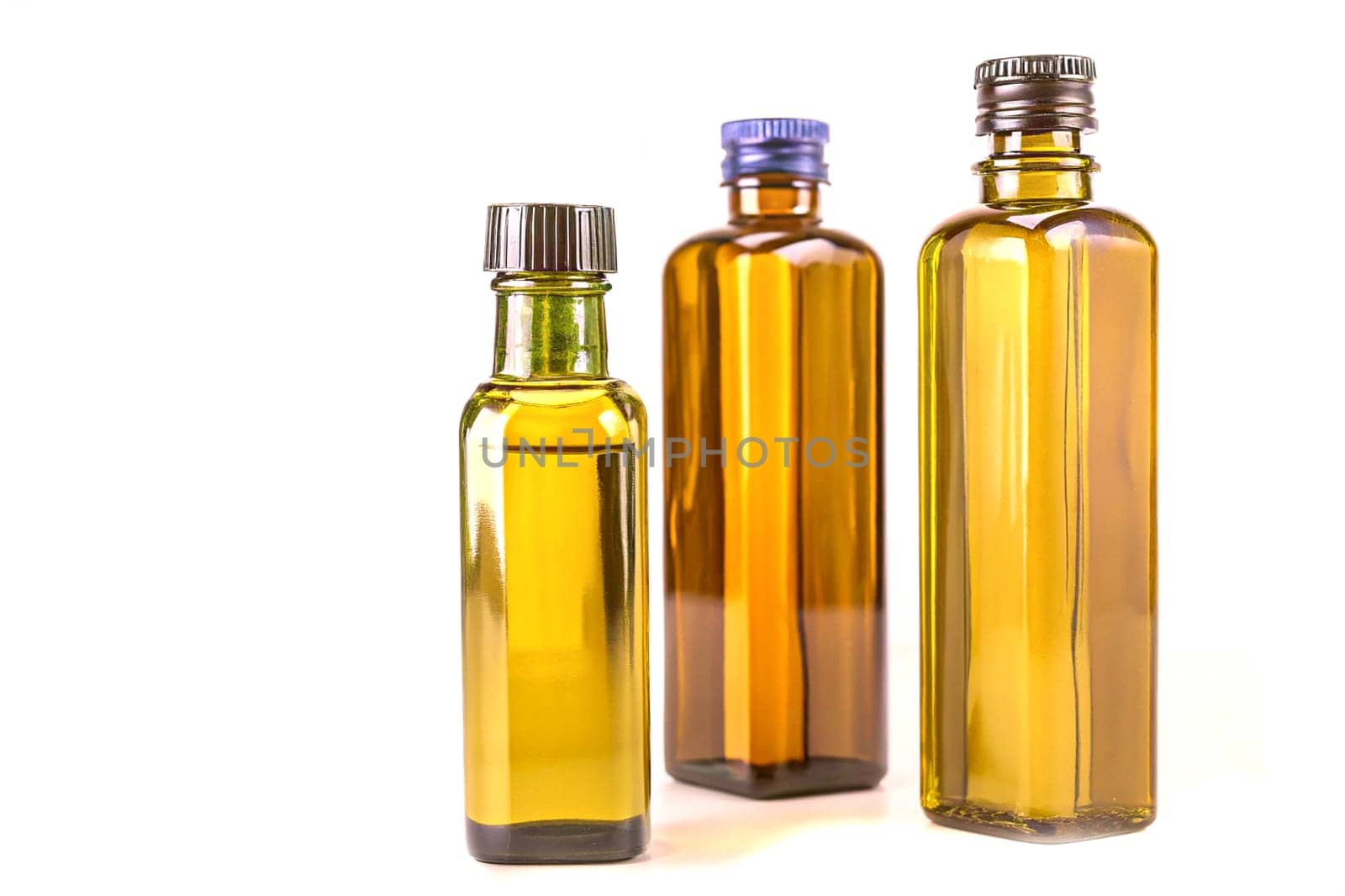 an oil derived from plants, e.g., canola oil, olive oil, sunflower oil