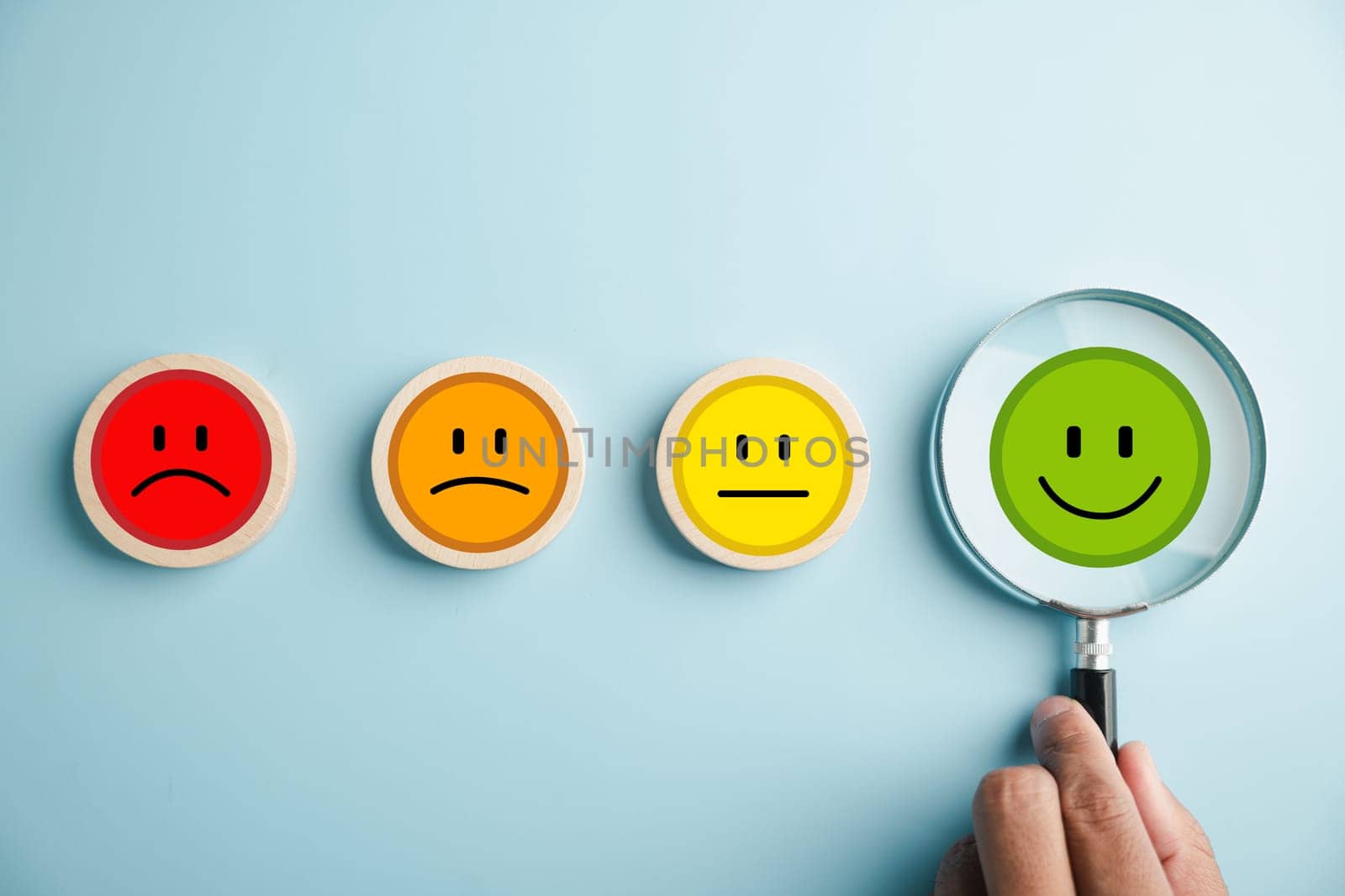 Magnifier in hand selected happy smiley face icon among emotions. Good feedback rating, positive customer review. Experience, satisfaction survey, mental health. Certificate demonstrates satisfaction.