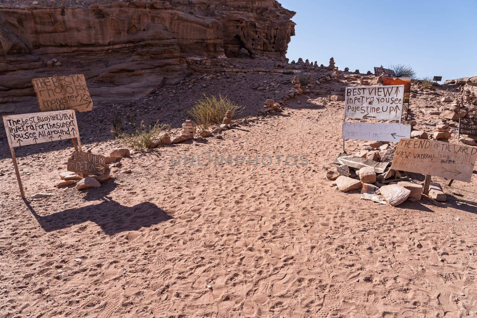 Signs to different views from the top of the trail to the Monastery of rocky mountain range and gorges