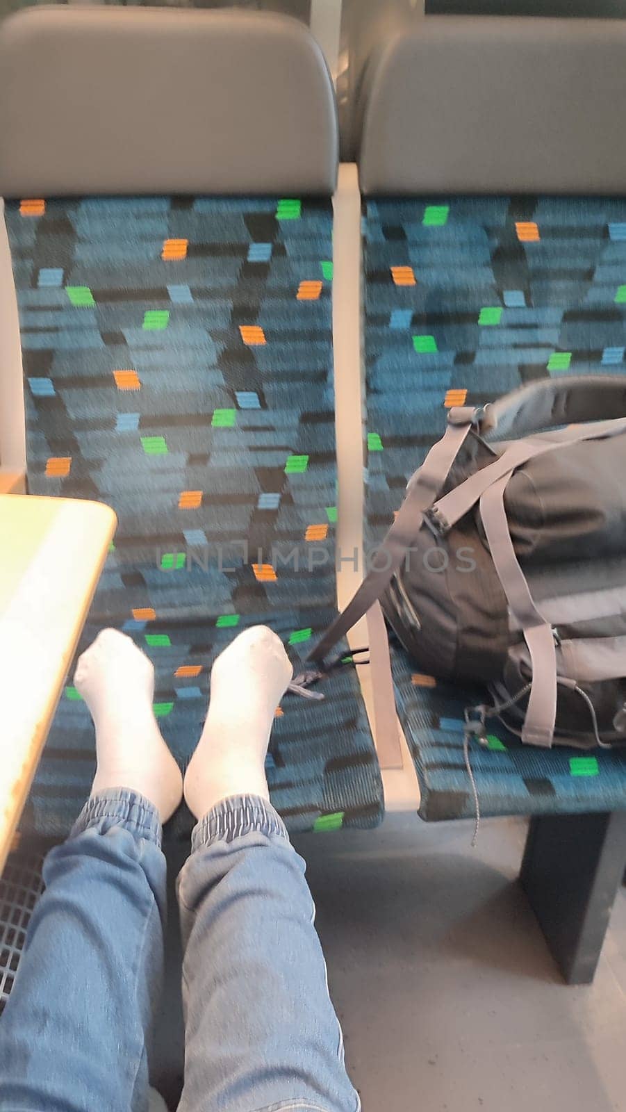 Feet backpack train people travel tourists tourism shotlisttravel women womens walking sitting waiting objects place destination . High quality photo transfer transport