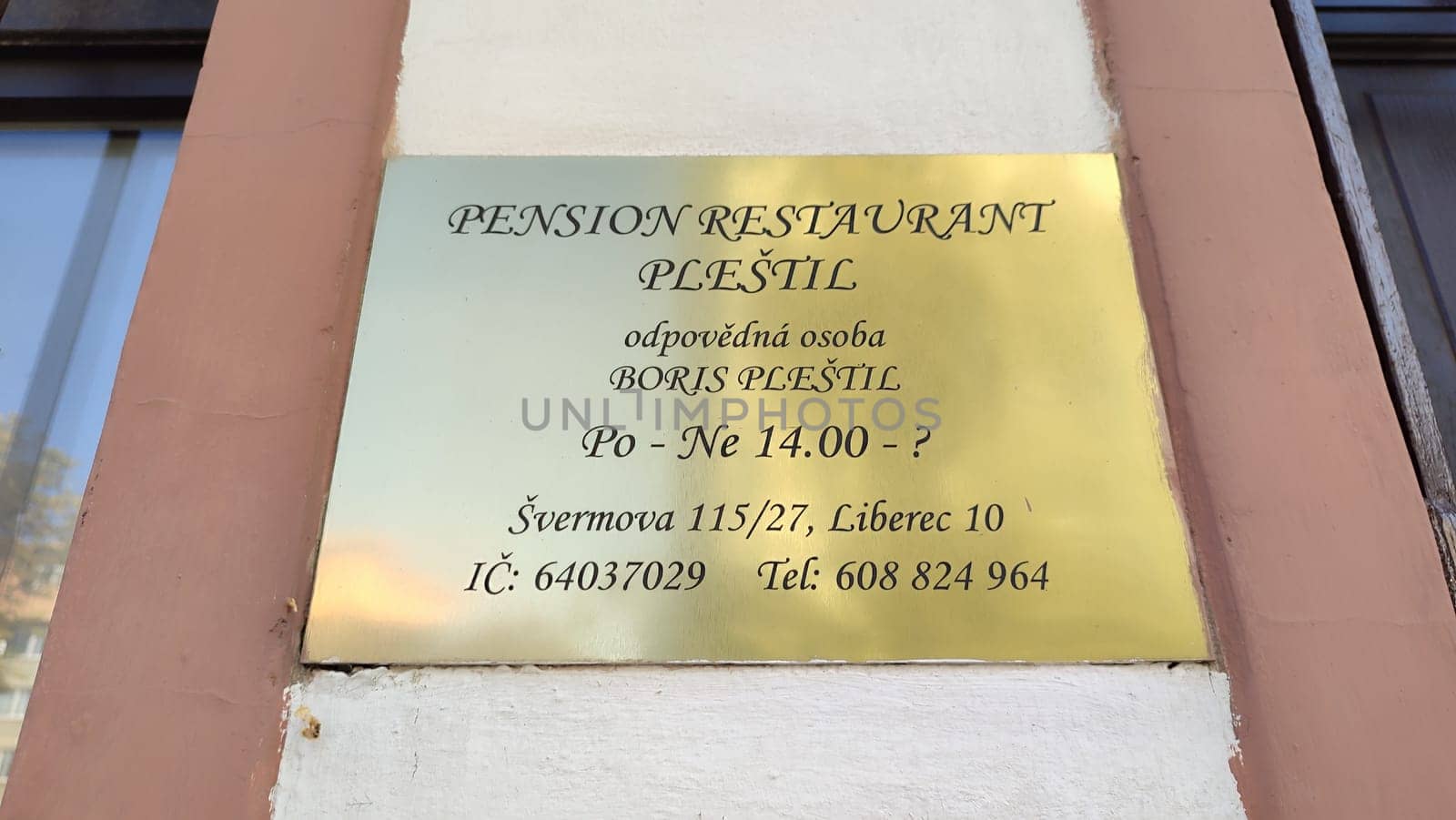 Liberec Czech Republic Europe October 18 2024 - Pension restaurant sign Plestil gold text information about hotel apartment building architecture street editorial shotlisttravel travel tourism place. High quality photo
