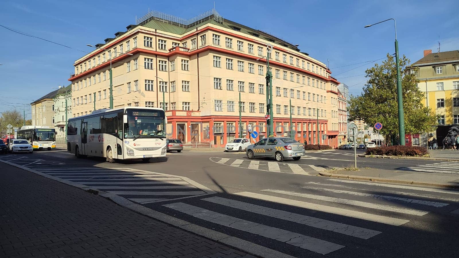 Liberec Czech Republic Europe October 18 2024 - City intersection bus building architecture street transport shotlisttravel outdoor hotel apartment travel tourism summer day place destination objects road . High quality photo