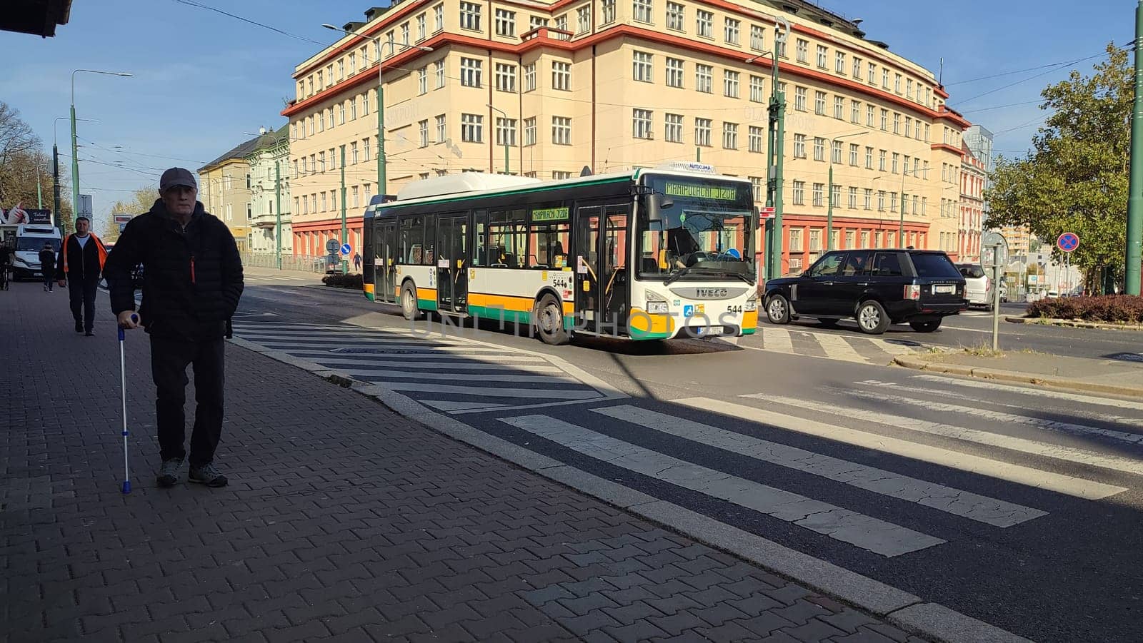 Liberec Czech Republic Europe October 18 2024 - City intersection bus building architecture street transport shotlisttravel outdoor hotel apartment travel tourism summer day place destination objects road . High quality photo people person
