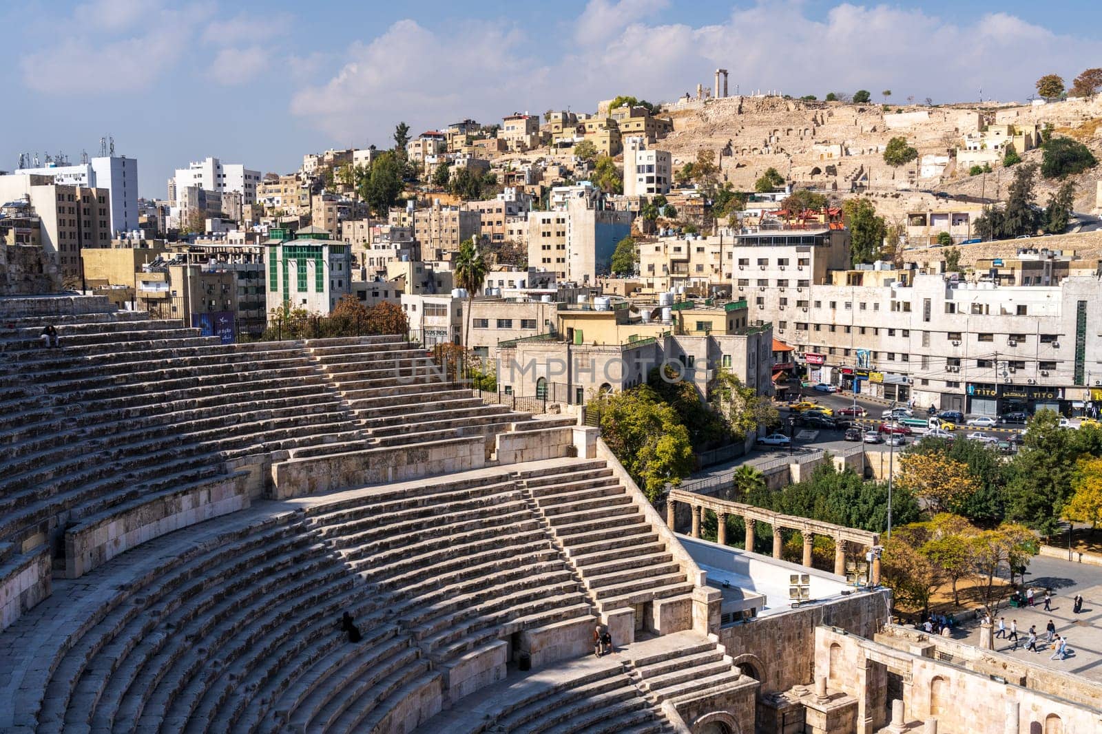 Amman, Jordan - 12 November 2024: Roman Theatre of Amman is a 6,000-seat, 2nd-century amphitheater with Amman Citadel opposite