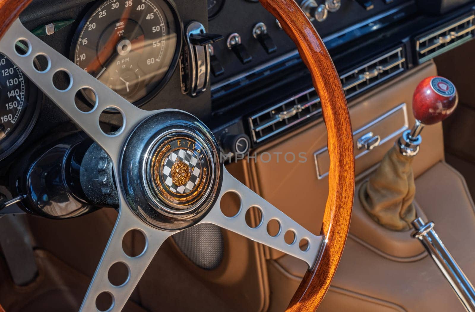 Georgetown, TX - 3 May 2025: Interior and steering wheel of a restored E-Type Jaguar 4.2 at a Texas car show