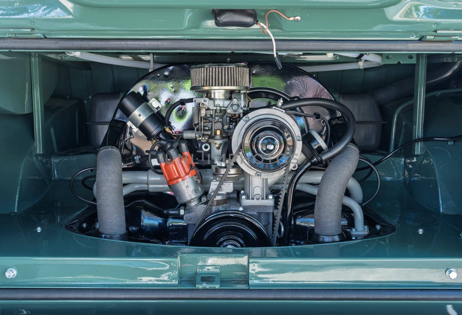 Georgetown, TX - 3 May 2025: Perfect restoration of the 1.7L air-cooled engine of 1972 Volkswagen camper van
