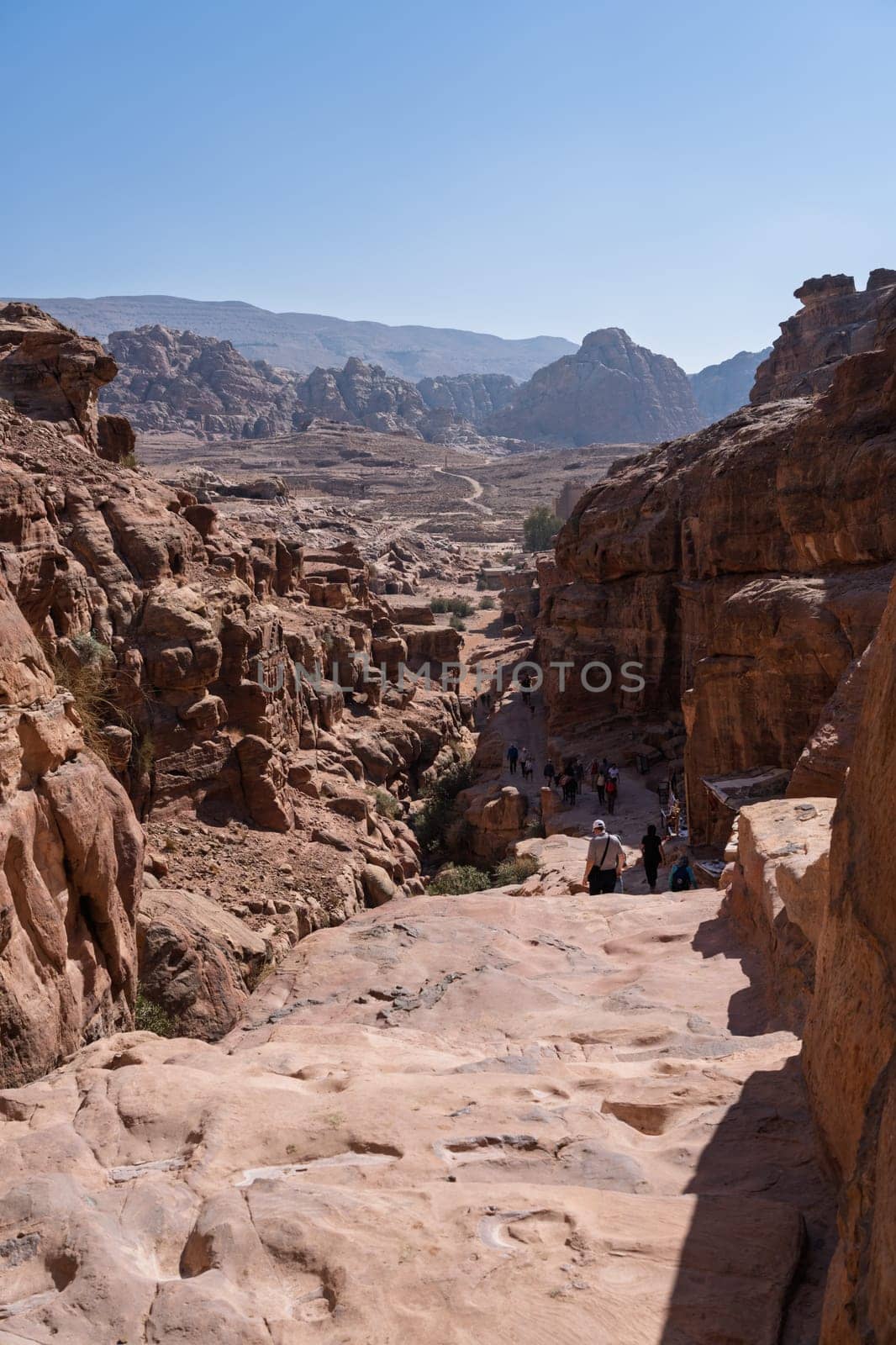 View down the trail to Ad Deir or the Monastery to the rest of the Petra site and temples