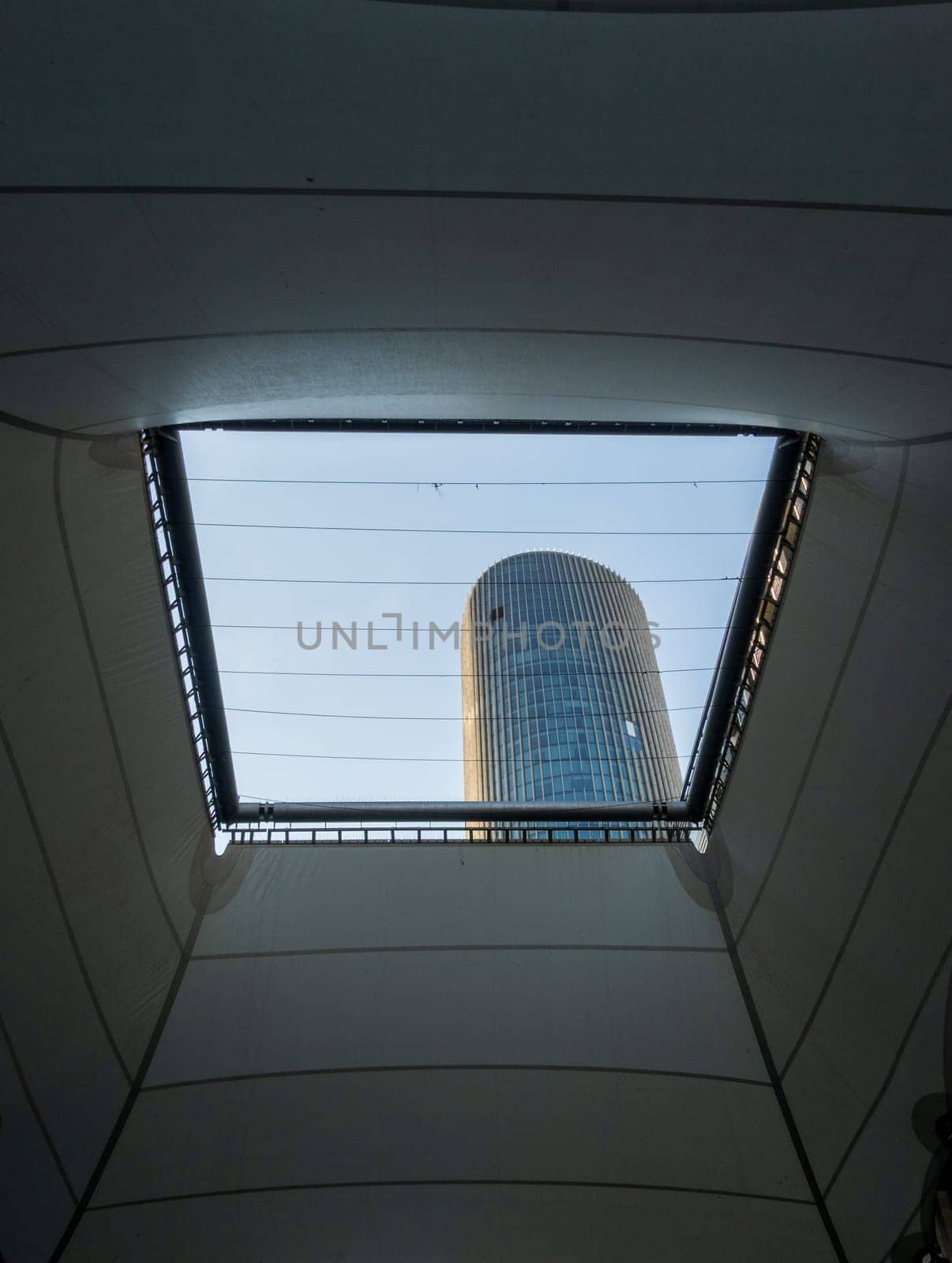 Unusual luxury hotel seen through a sail like shade in the Adbali Mall in the north of the capital city