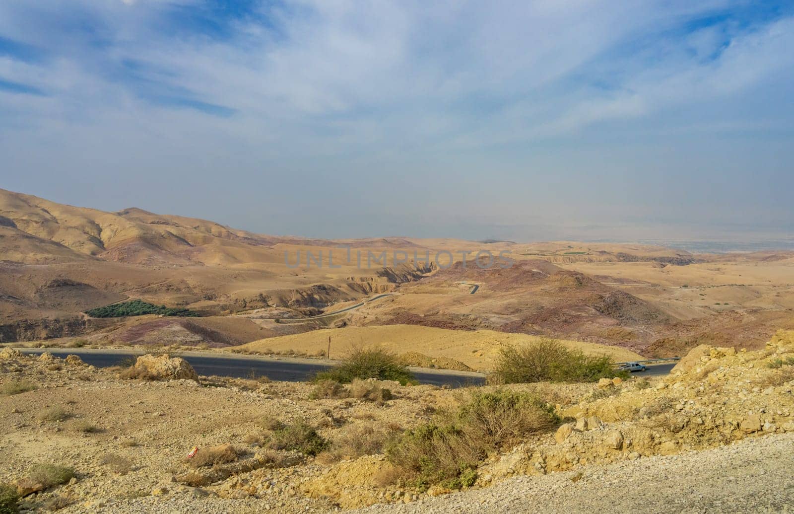 Arid landscape in Jordan on the road from the Dead Sea to Mount Nebo in the desert area of the country
