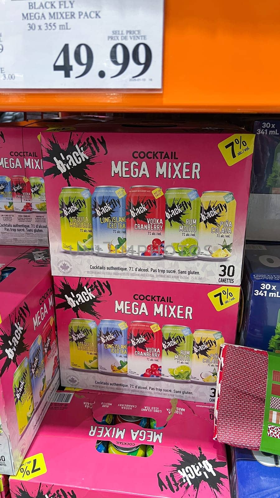 Ottawa, Canada - May 01, 2025: Black Fly Mega Mixer Pack displayed on a retail shelf, featuring colorful cocktail cans with eye-catching designs, offering variety of flavors for cocktail and party