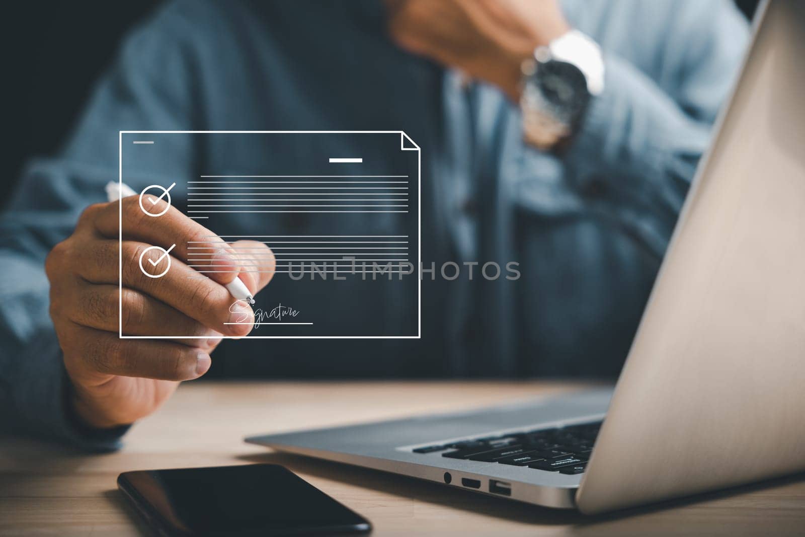 Closeup of businessman's hand using pen to sign electronic documents on virtual screen. Illustrates paperless office concept, e-signing, and document management. Agreement is confirmed.