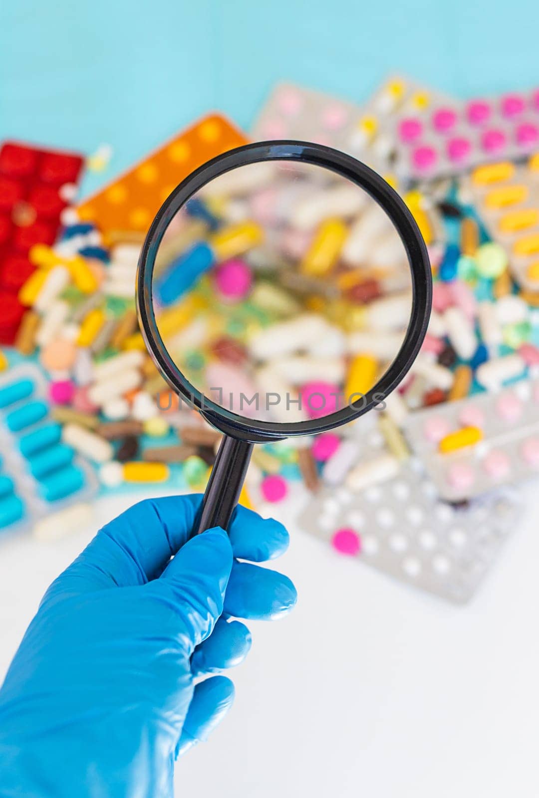 examine drugs in the laboratory. Selective focus. pills.