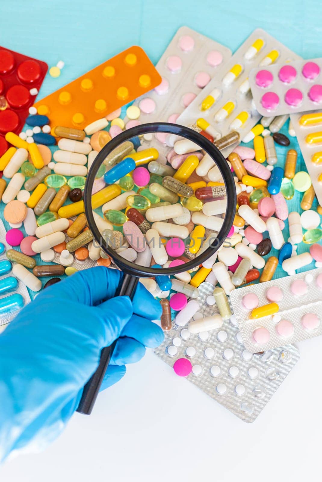 examine drugs in the laboratory. Selective focus. pills.