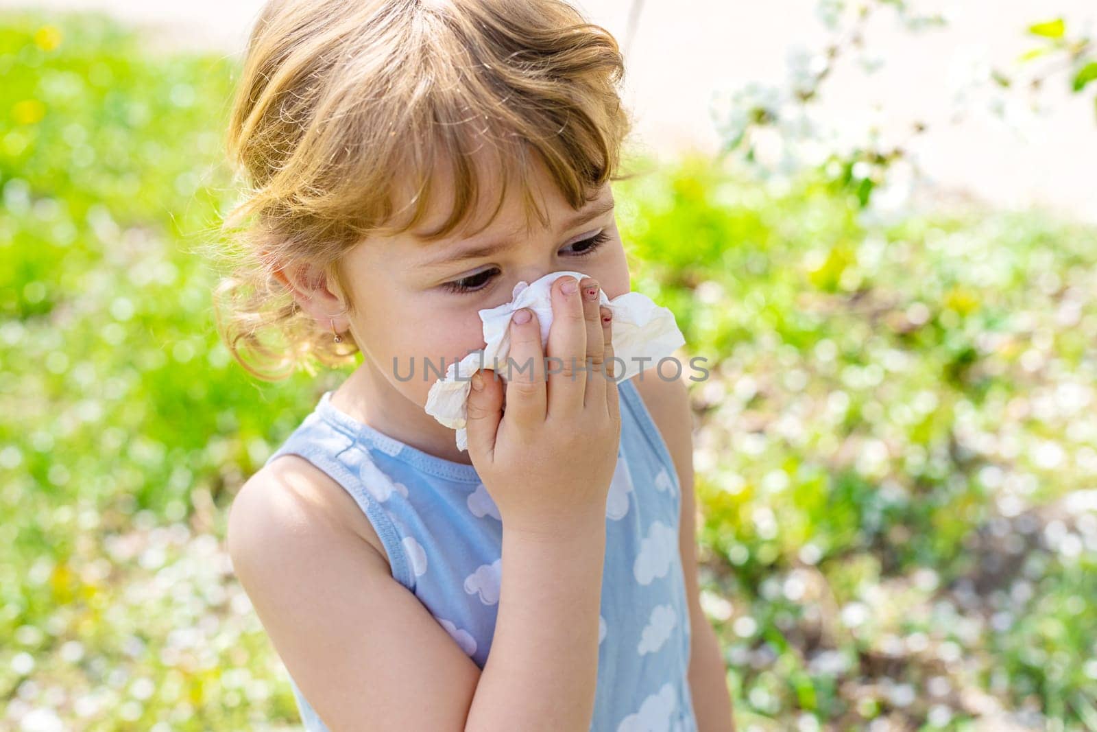 child allergic to flowering trees. Selective focus. kid.