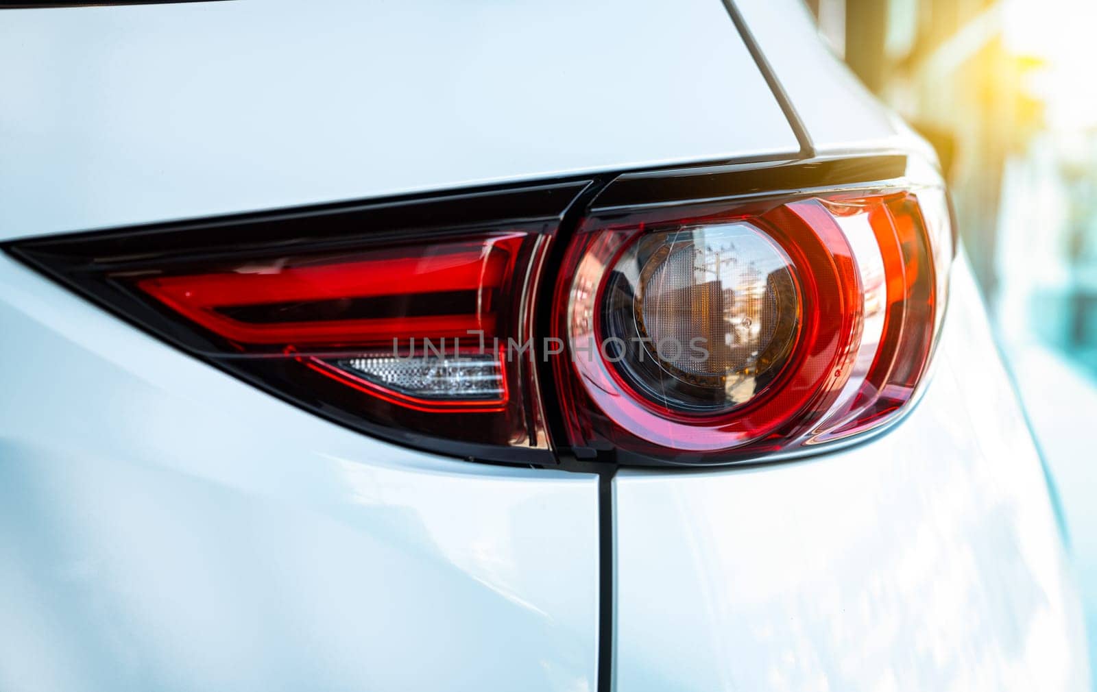 Car parked in luxury showroom. Car dealership office. Car showroom business. New car parked in modern showroom. Auto for sale and rent business. Automobile leasing and insurance. Electric automobile.