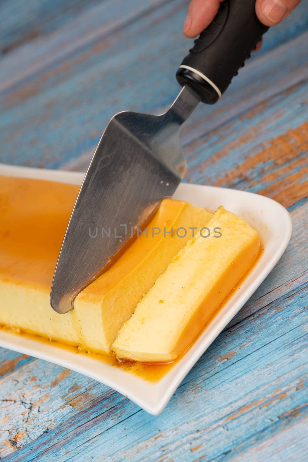Cream caramel pudding with caramel sauce on a plate, Flan, High quality photo