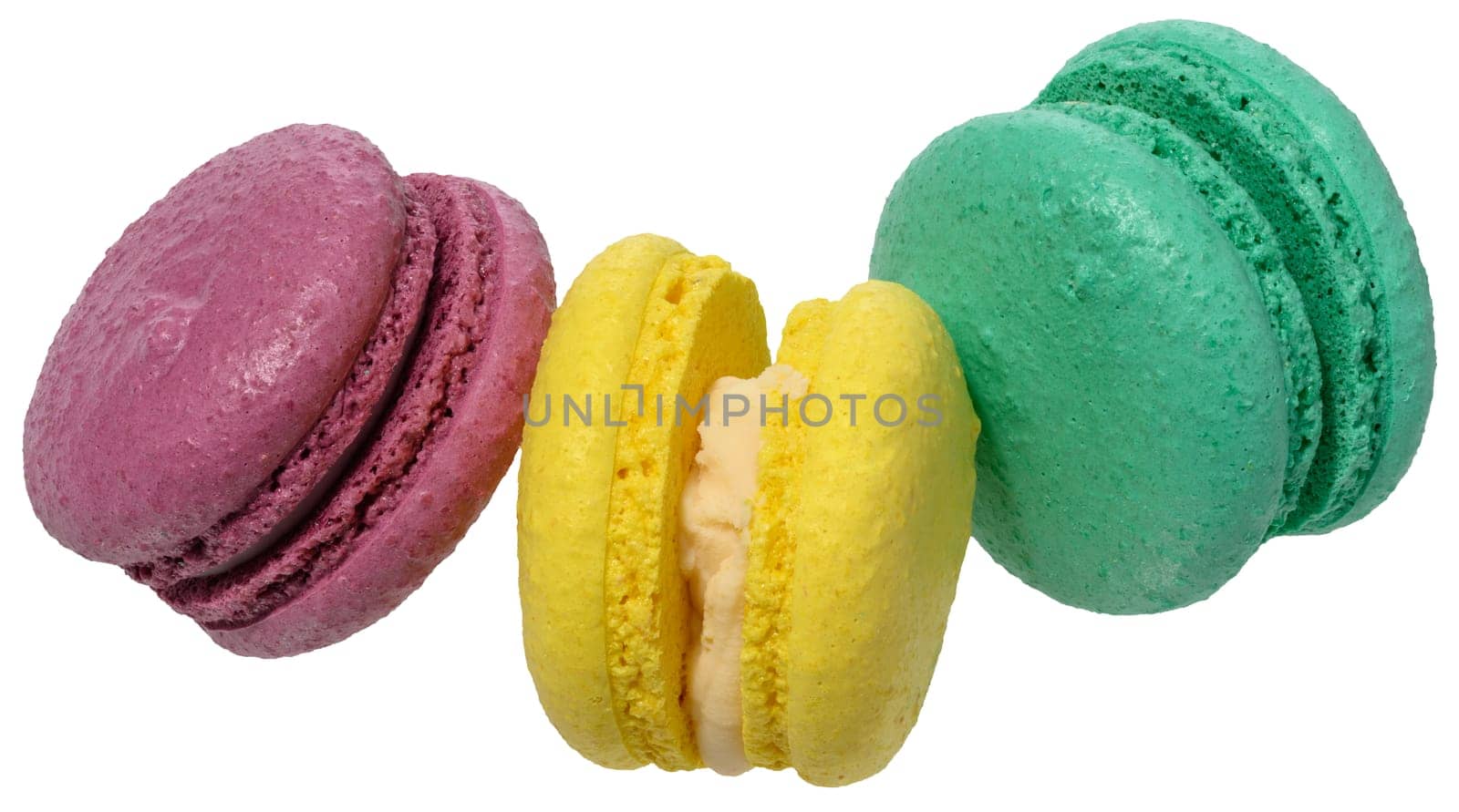 Macarons with a creamy white filling, isolated background. The macaron has a smooth, porous shell, close up