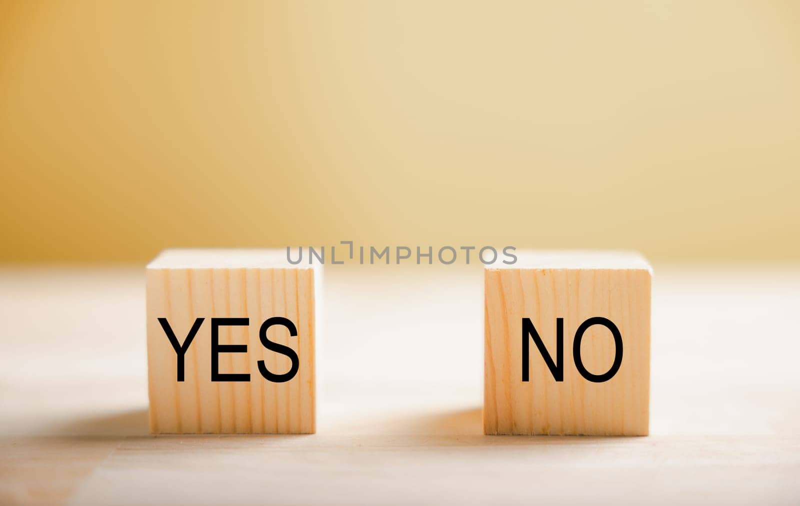 Representation of yes or no choice on wooden blocks. Demonstrates business and lifestyle concepts. Decision-making visualized. Think With Yes Or No Choice.