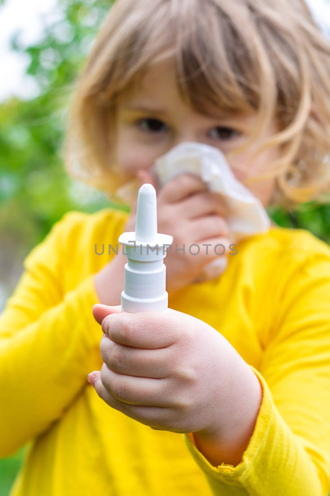The child is allergic to dandelions. Selective focus. Kid.