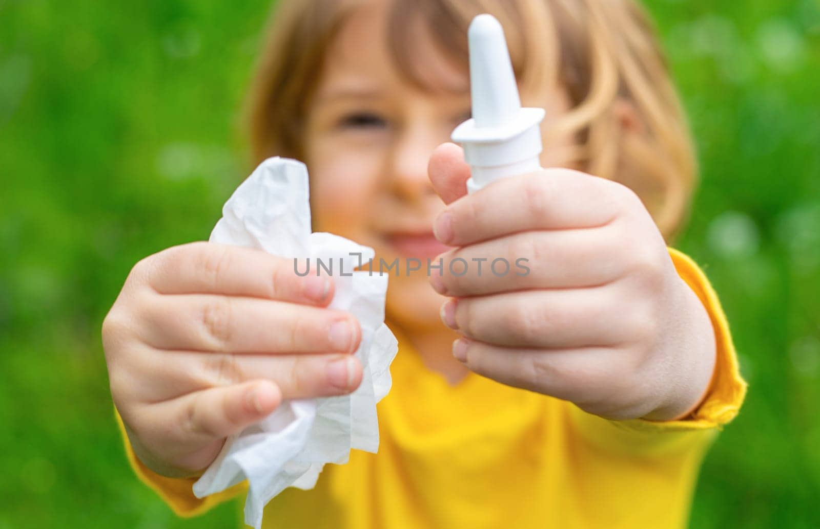 The child is allergic to dandelions. Selective focus. Kid.