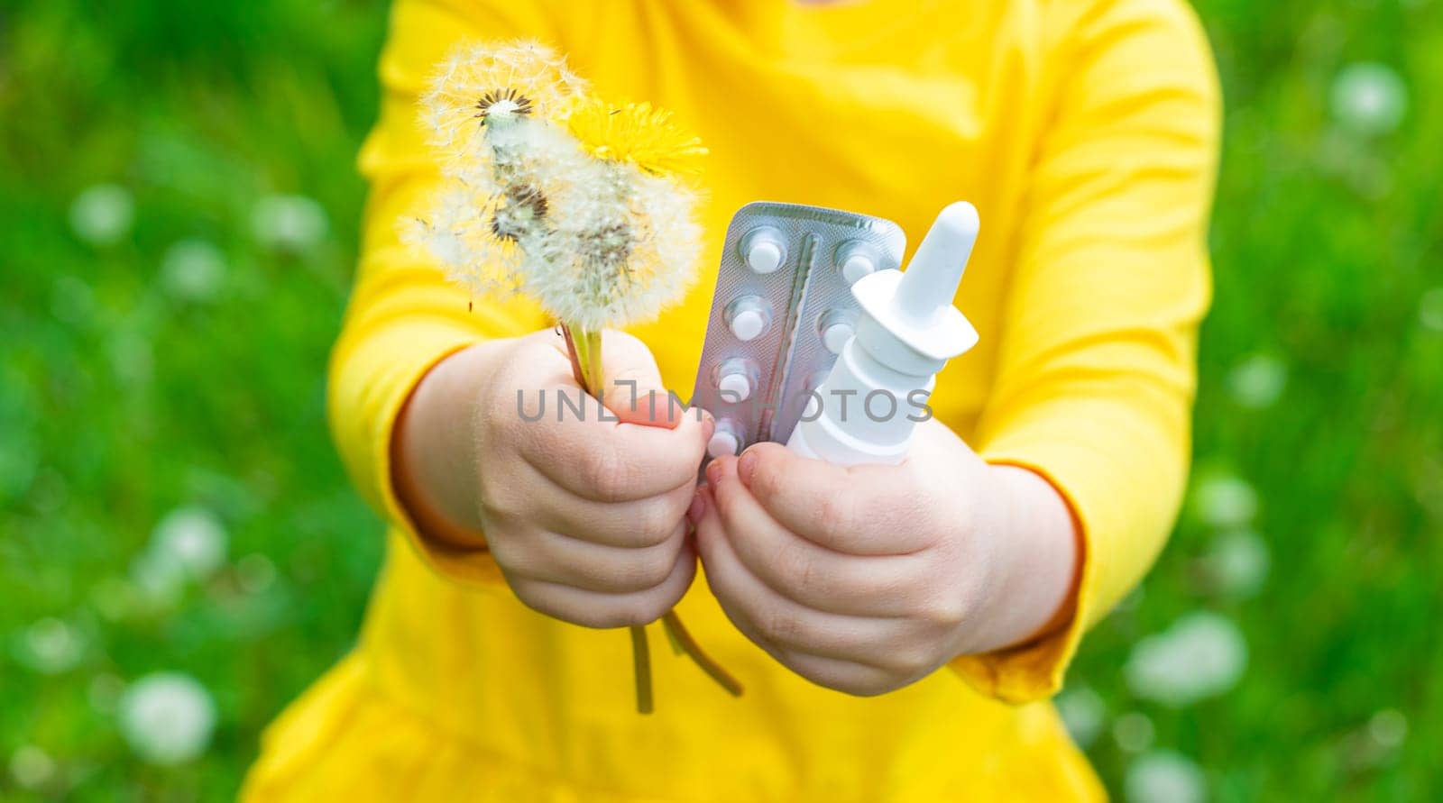 The child is allergic to dandelions. Selective focus. Kid.