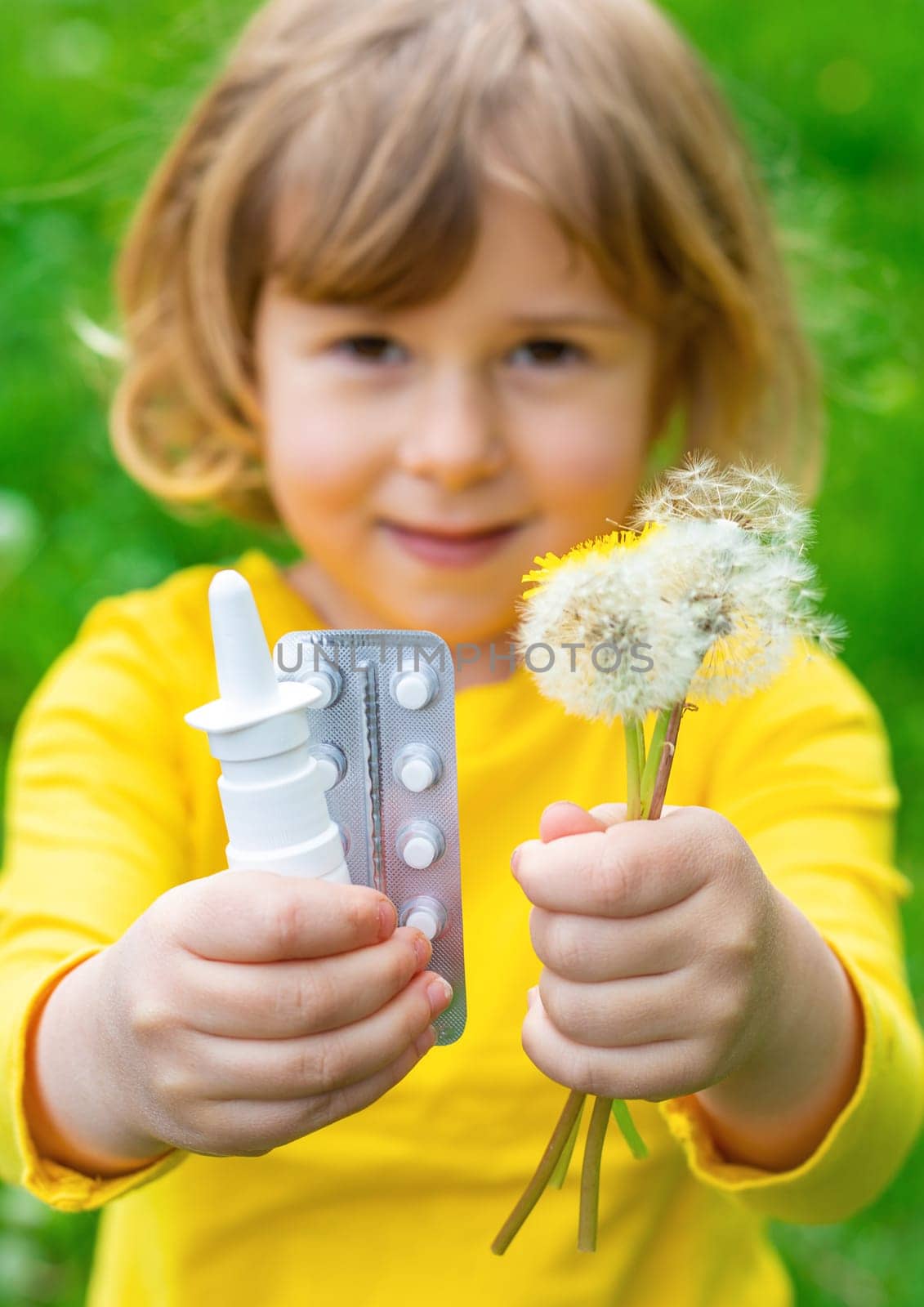 The child is allergic to dandelions. Selective focus. Kid.
