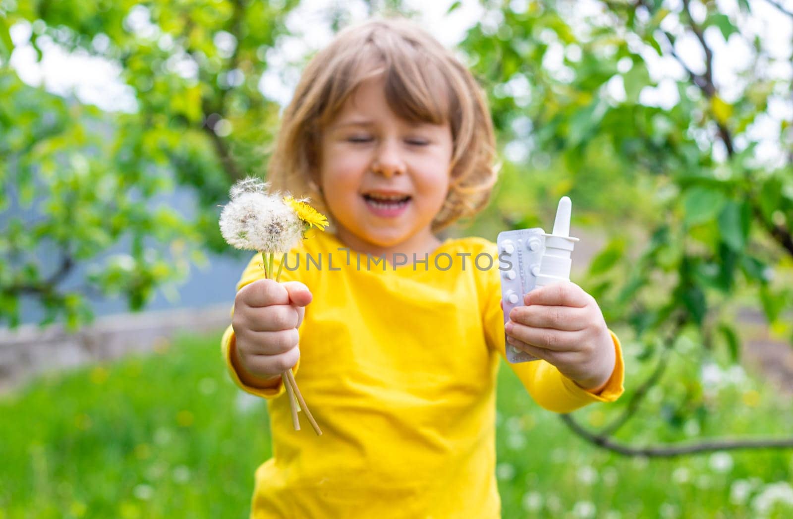 The child is allergic to dandelions. Selective focus. Kid.