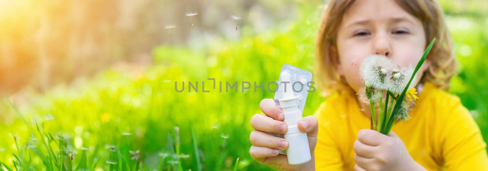 The child is allergic to dandelions. Selective focus. Kid.
