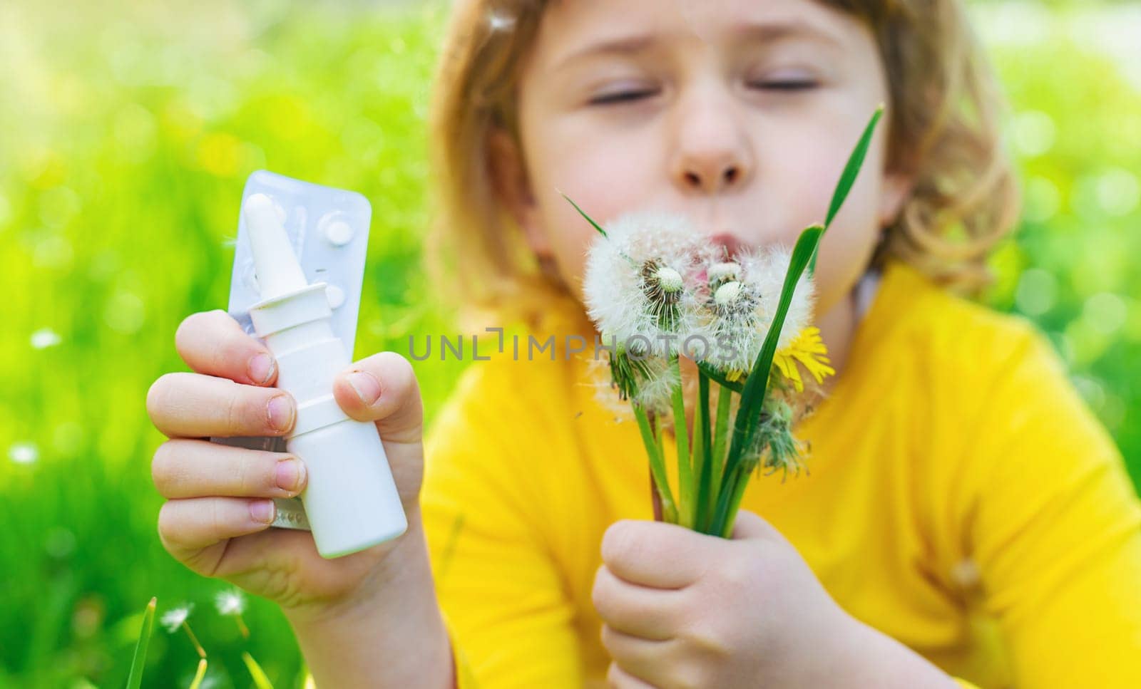 The child is allergic to dandelions. Selective focus. Kid.