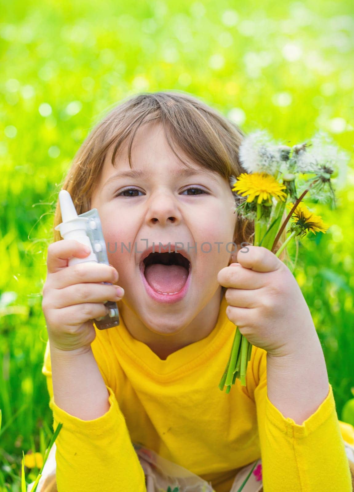 The child is allergic to dandelions. Selective focus. Kid.