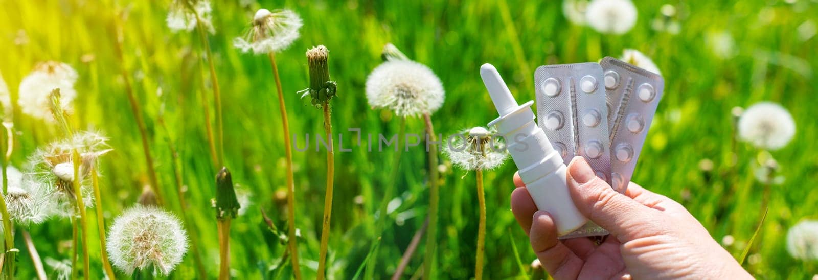 Allergy remedies in hands. Selective focus. Kid.