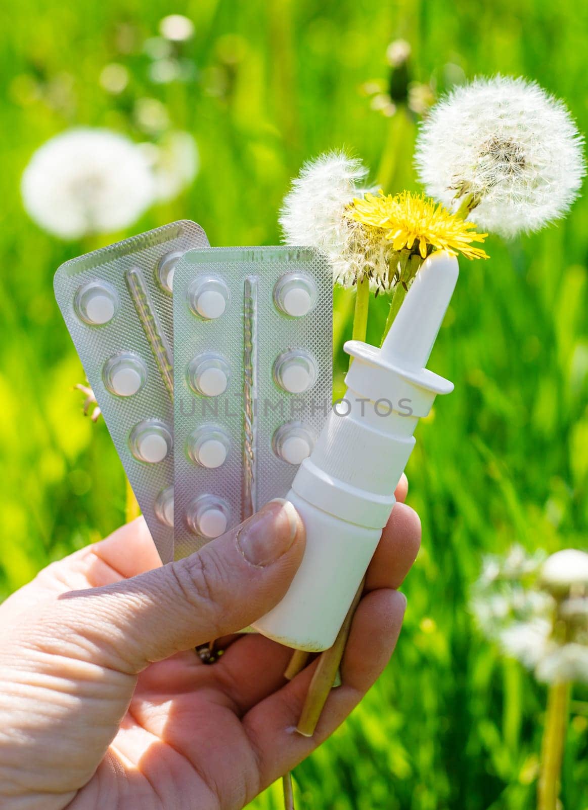 Allergy remedies in hands. Selective focus. Kid.