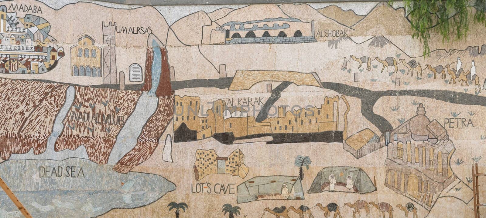 Wall mural showing outline map of Jordan historic sites including Dead Sea and Petra in Madaba