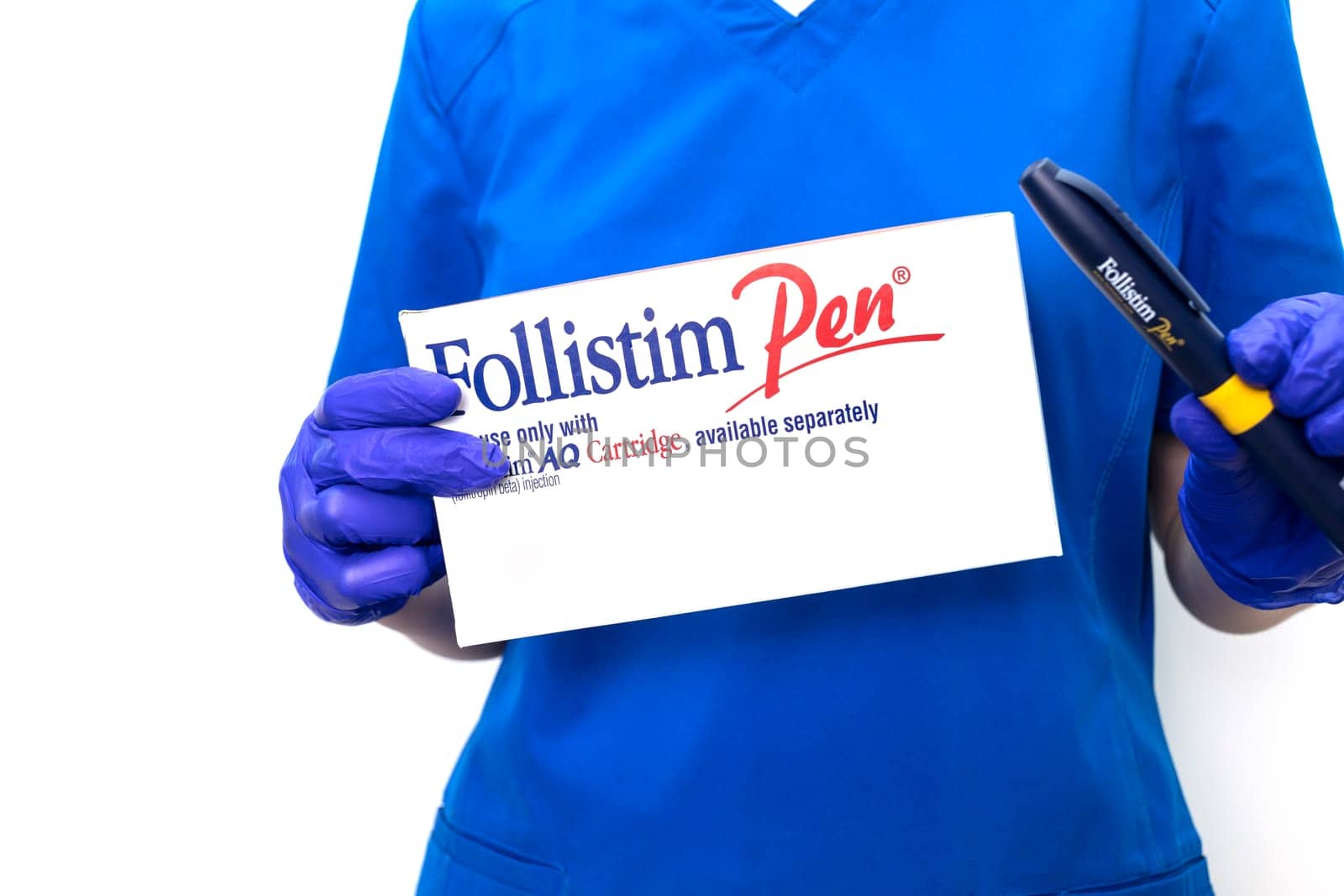 Cropped Doctor Holds Of Follistim Pen On White Background, Medical Injection Device Used In Fertility Treatments To Administer Follicle-stimulating Hormone, FSH. Infertility Phoenix, Usa:16.05.2025