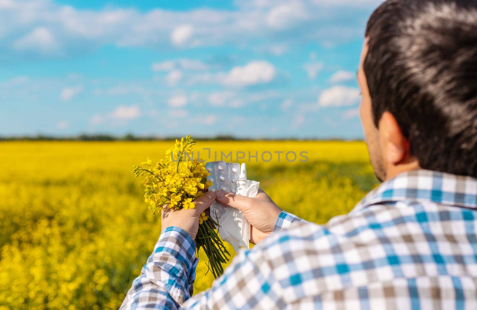 Yellow field flowers allergy. Selective focus. Nature.