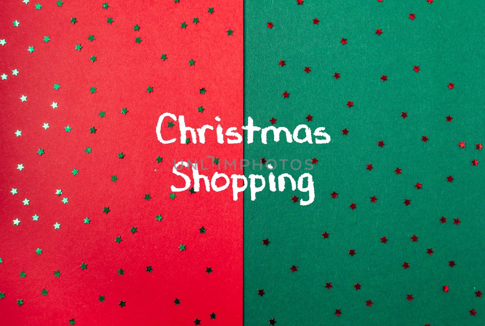 Red and green background with Christmas stars and the words Christmas shopping written on it. The stars are scattered all over the background