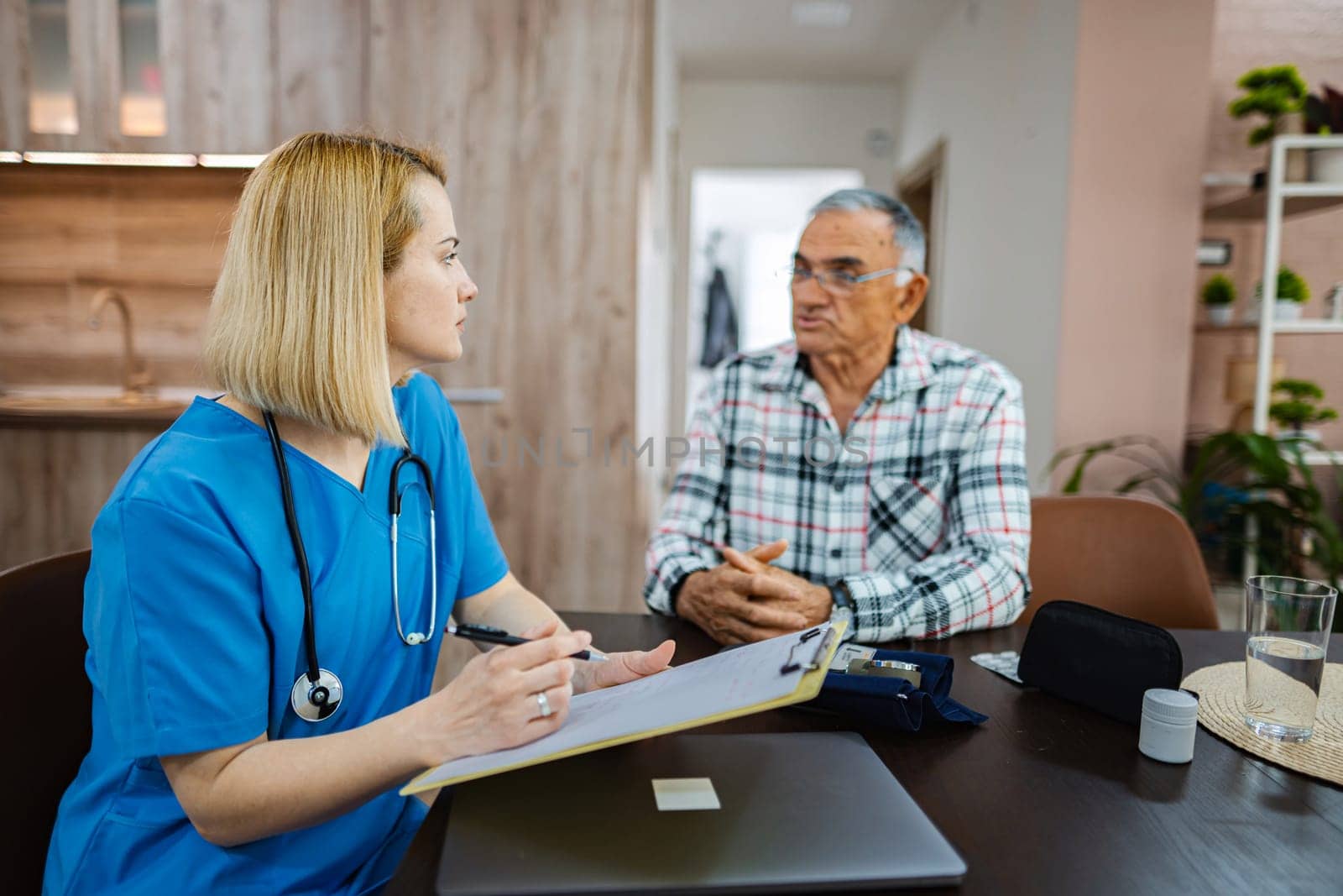 Medical professional discusses health concerns with patient.