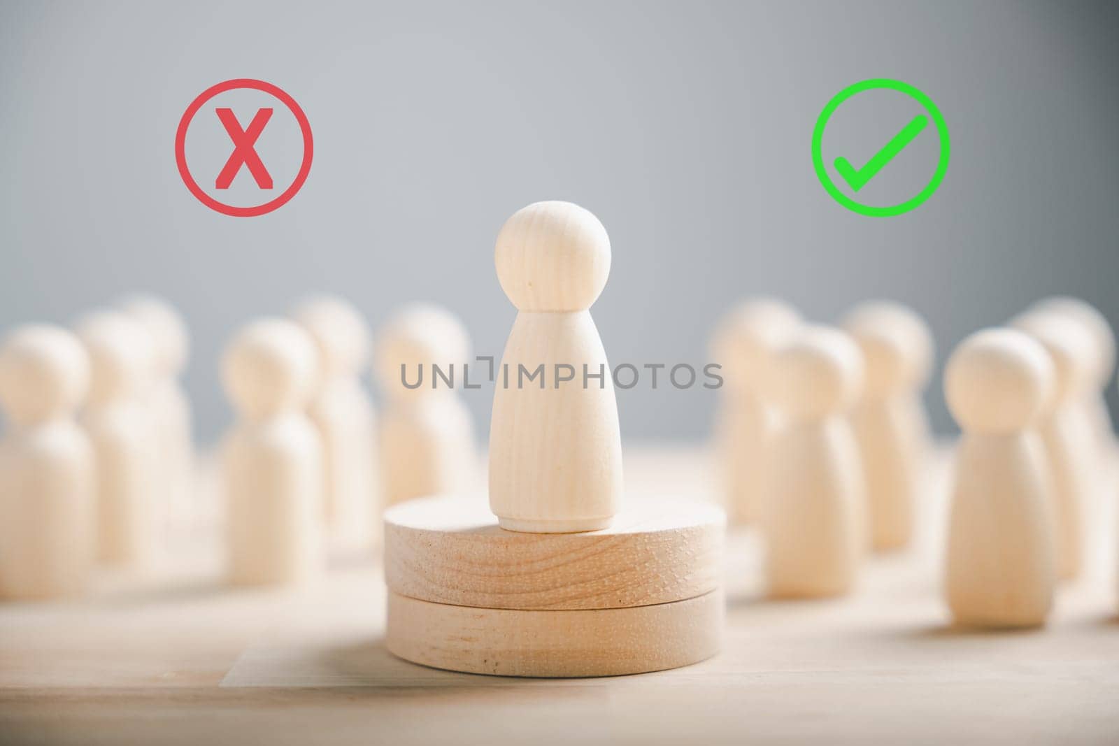 Wooden peg dolls atop a cube among others vote yes or no symbols. Reflects open-mindedness in elections involving candidates and electorates. Think With Yes Or No Choice.