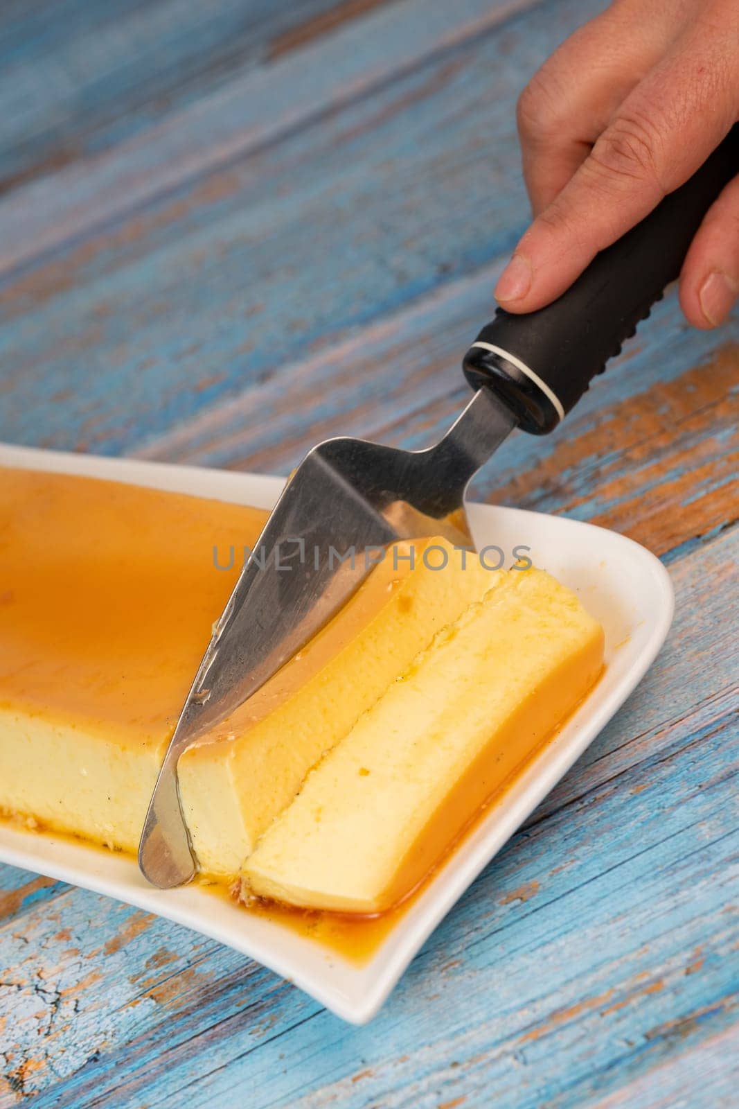 Cream caramel pudding with caramel sauce on a plate, Flan, High quality photo